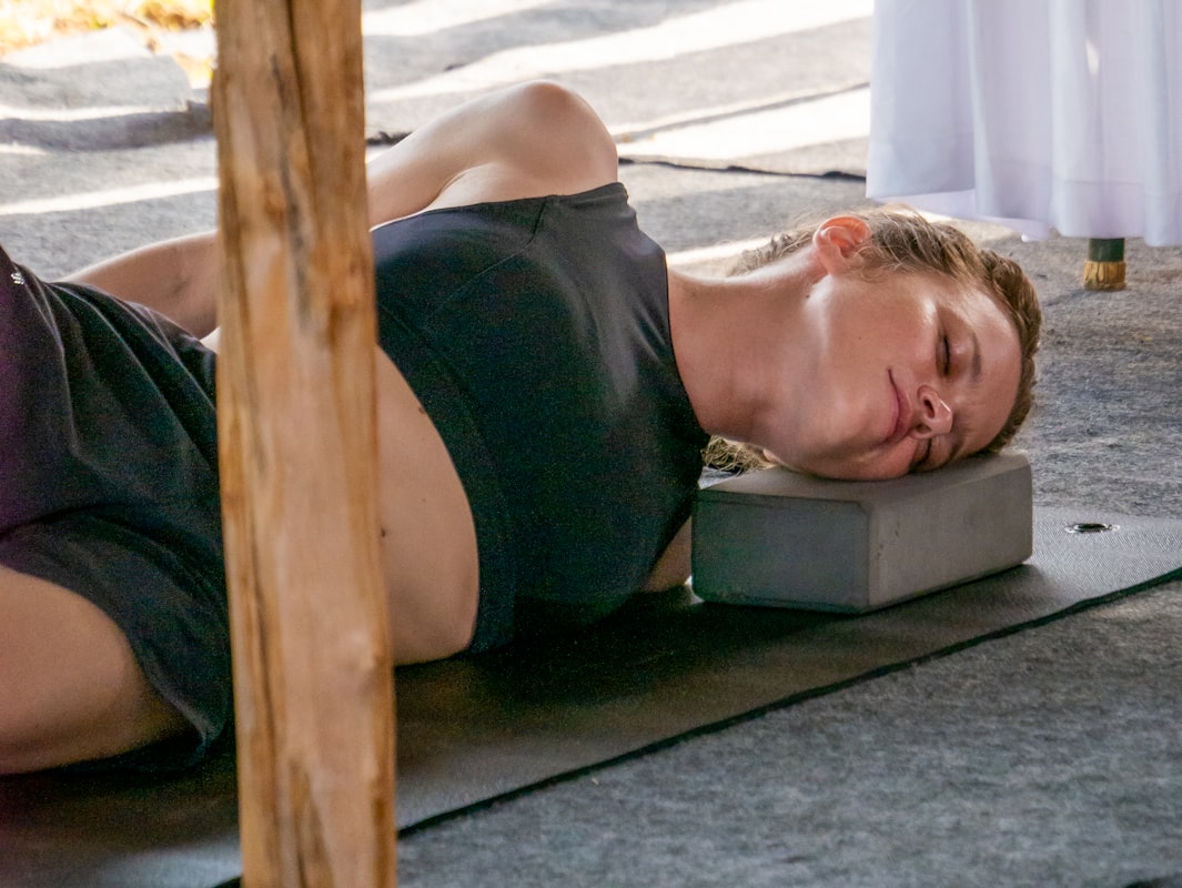 Instructor demonstrating yoga pose